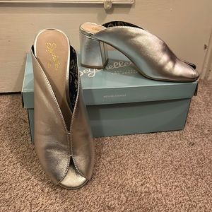 Silver peep toe block heel mules
